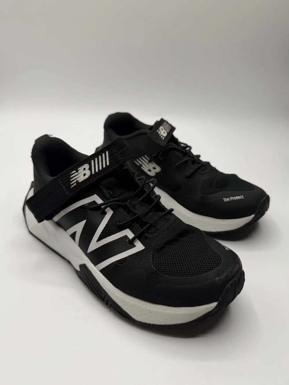 New Balance Kids' Black & White Athletic Sneakers- Size 13 kids